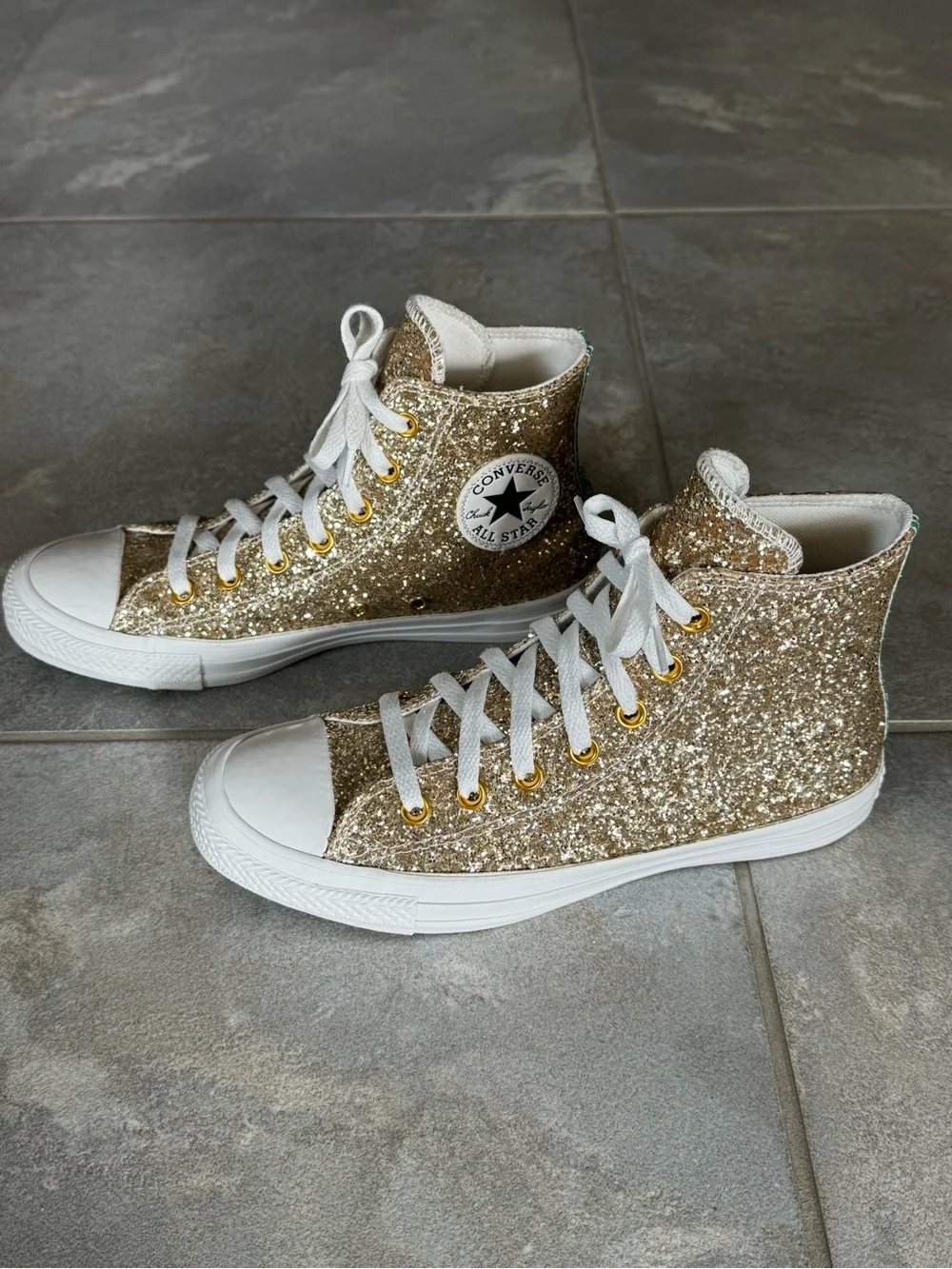 Gold glitter high top converse